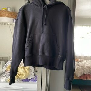 Aritzia TNA cropped black hoodie w front pocket. $30 OBO. Good condition.